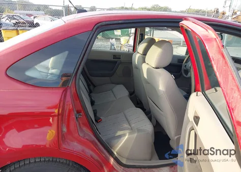 2009 Ford Focus Se z USA, uszkodzony, nr VIN 1FAHP35N39W120833